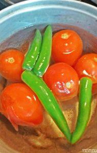 Boiling tomatoes and chiles